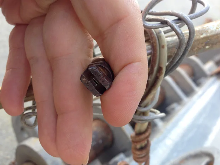 Worn nozzle removed from a dust suppression line during an audit
